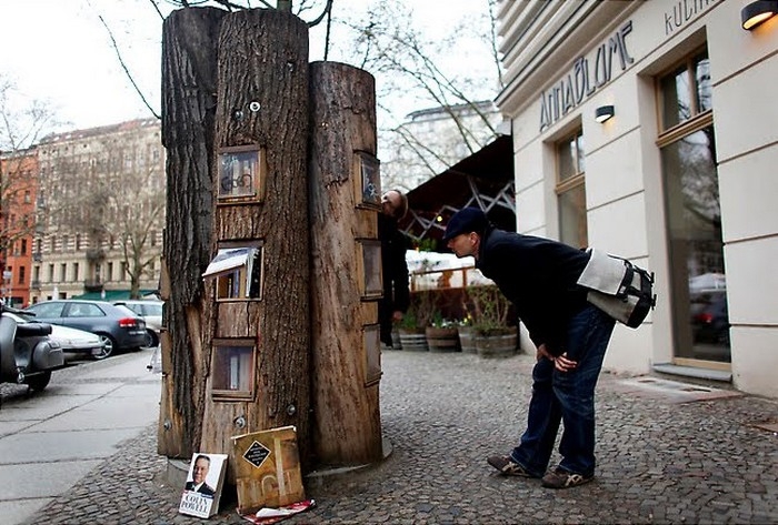  A Neighborhood In Germany Has A Book Exchange Inside Of Tree