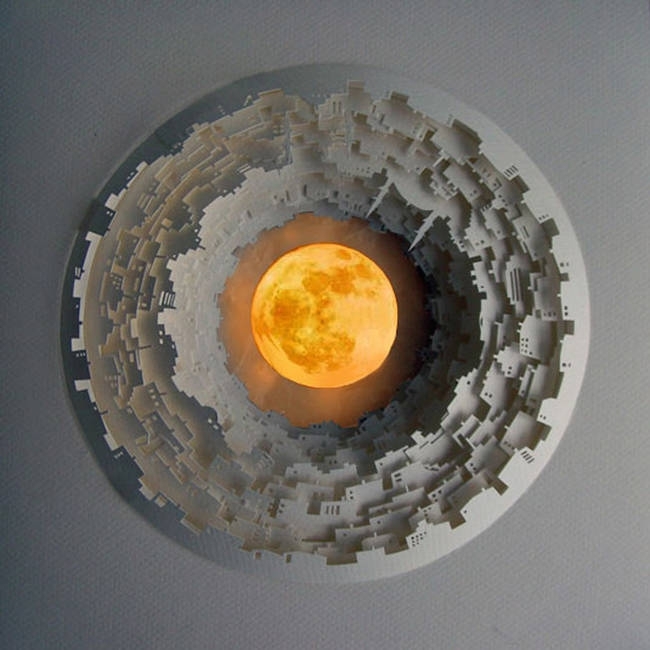 These Spinning Worlds Were Created Using Only Paper And Imagination