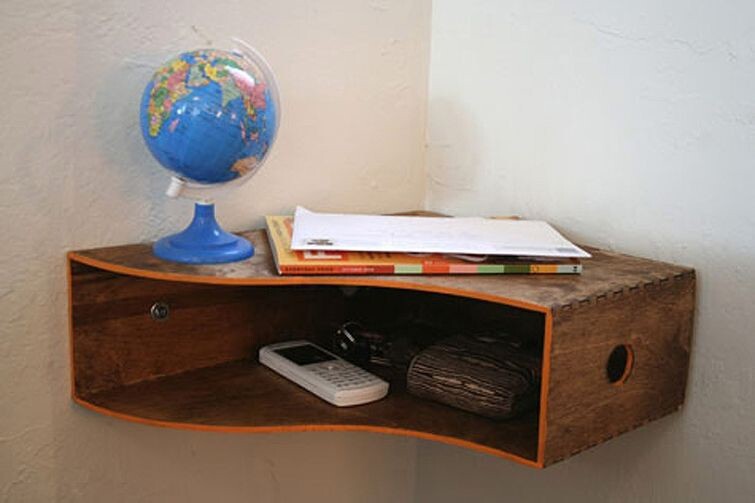 Up-cycle a shelf for items that create clutter on your tabletops and counters.