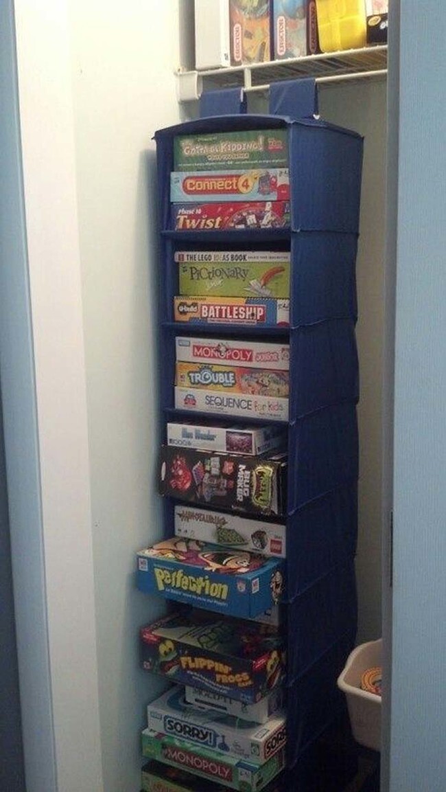 Use hanging cloth shelves in your kid's toy closet to store board games.