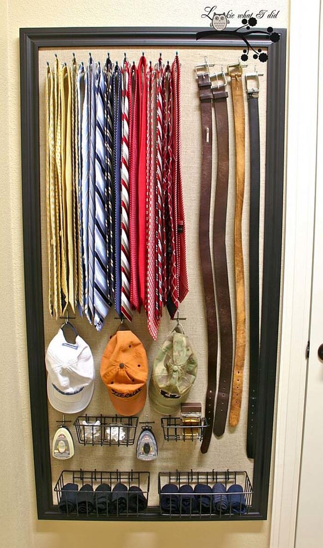  A cork board with hooks easily stores ties, belts, hats, and more.