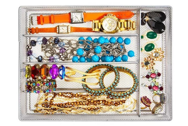 Use a utensil sorter to store jewelry and watches.