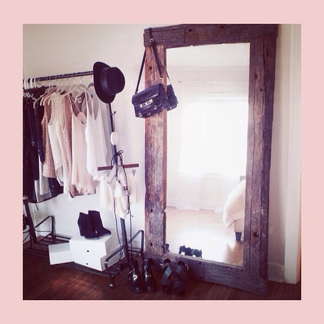 If your closet is jam-packed, consider displaying your favorite pieces on a visually appealing rack in your room.
