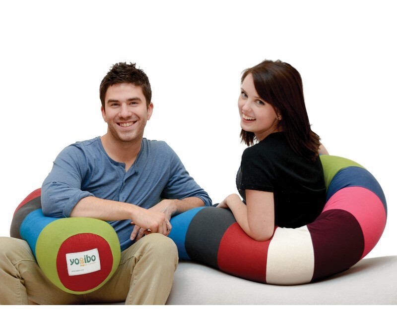 4. Cozy on up to your partner with this flexible caterpillar pillow.