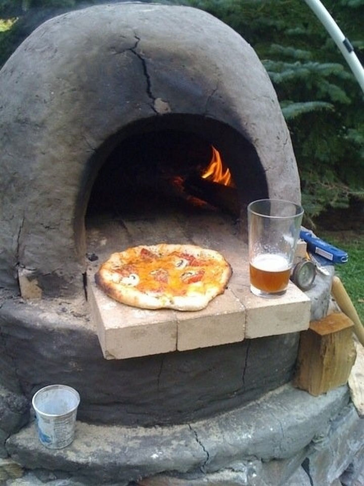 16) Make awesome homemade pizza in your own outdoor pizza oven