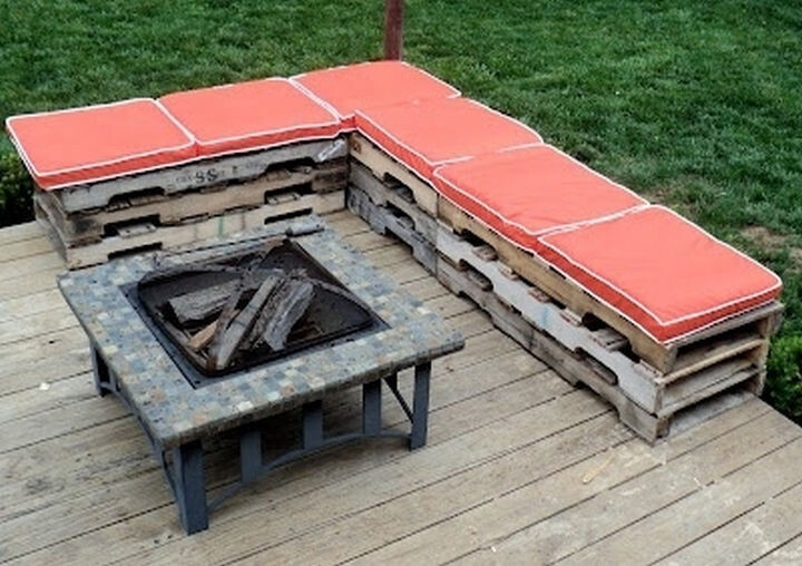 6) Create a makeshift sectional seating area by repurposing inexpensive wooden pallets