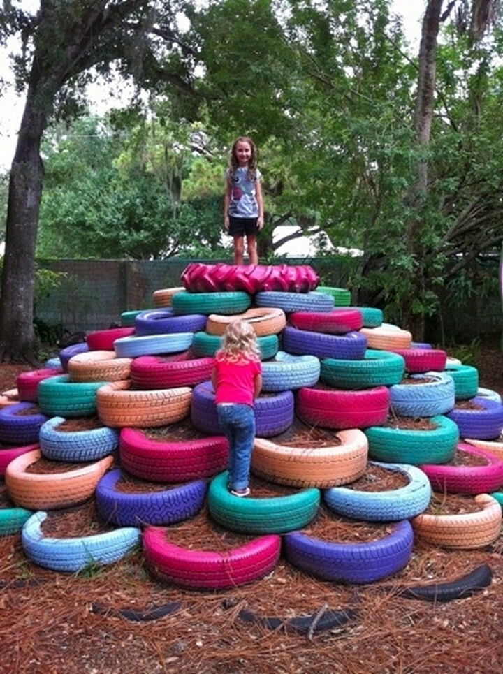 17) Repurpose used tires and made a backyard playground