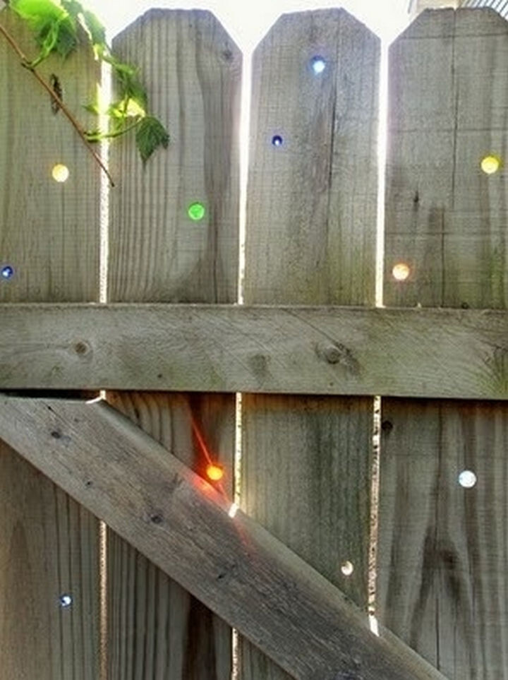 23) Put marbles in your fence to fill any holes in your wooden fence