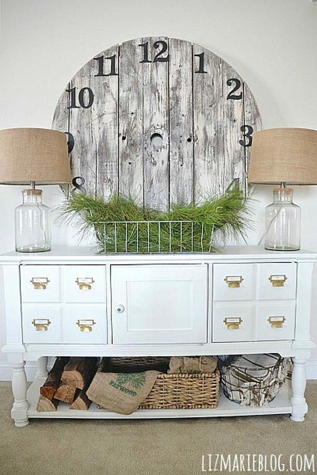 A round pallet becomes a wall-art clock with iron numbers.