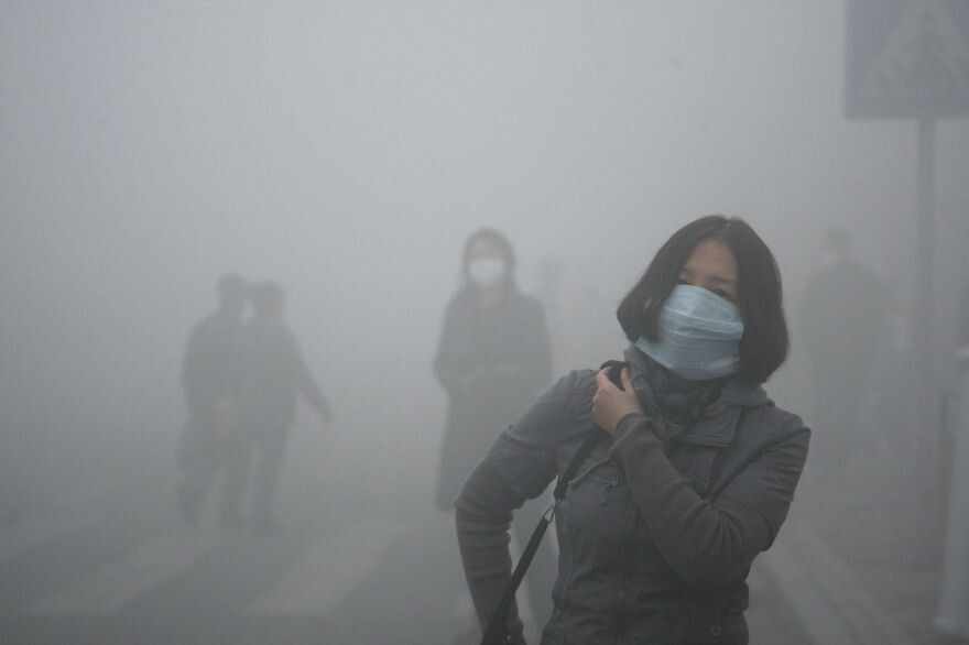 Girl Walks Through Smog In Beijing