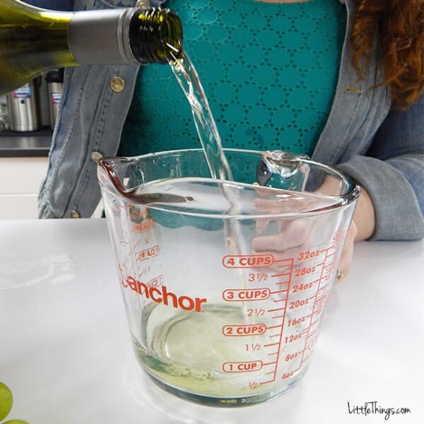 Measure out 2 cups of white wine. We used a Sauvignon Blanc, but feel free to use your favorite wine!