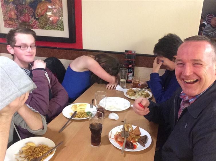 1. This dad who decided to use his new selfie stick at dinner