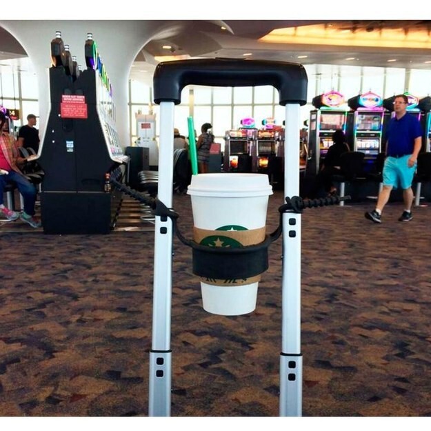 This cup holder that fits perfectly onto your rolling suitcase handle:
