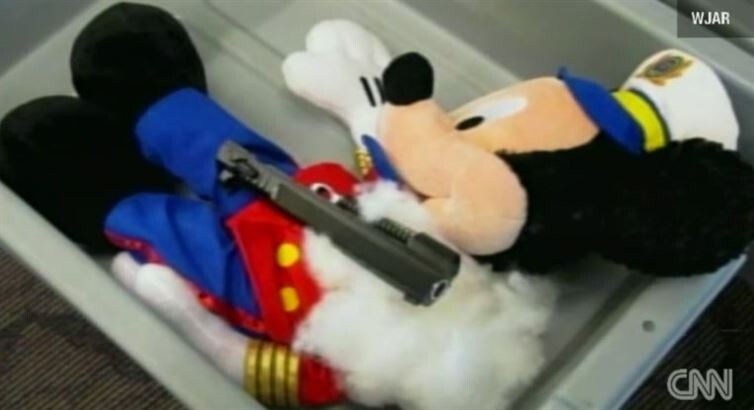 12. .40 caliber firearm stuffed inside a Mickey Mouse toy