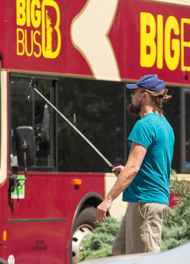 15. Then grew his hair even more and his beard even more and posed with a selfie stick.