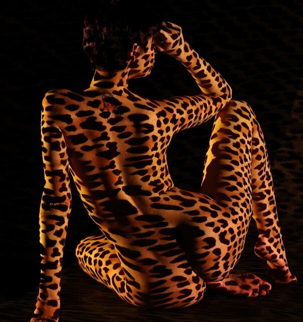 Photographer Dresses Nude Women In Light And Shadows 