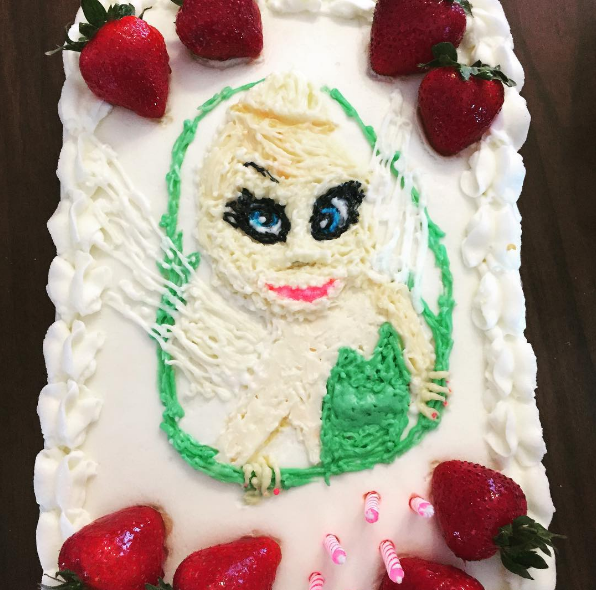 This cake that would be beautiful if not for the horror-film version of Tinker Bell on it.