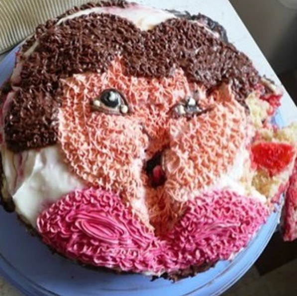 This not quite adorable Dora the Explorer cake.