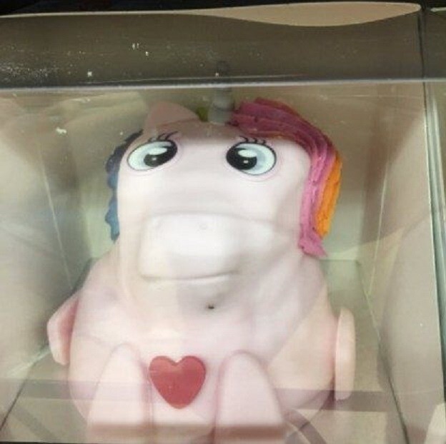 This unicorn cake that is either stoned or plotting your murder.