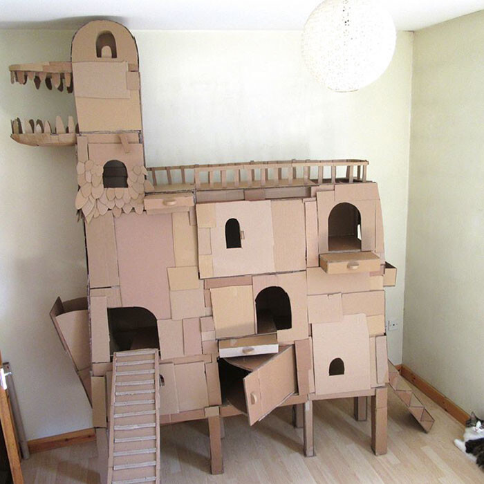 Inspired by his beloved kitty Denni, the entire thing is made out of cardboard and held by hot glue