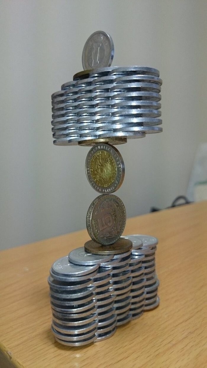 Japanese Guy Stacks Coins Like You Wouldn’t Believe