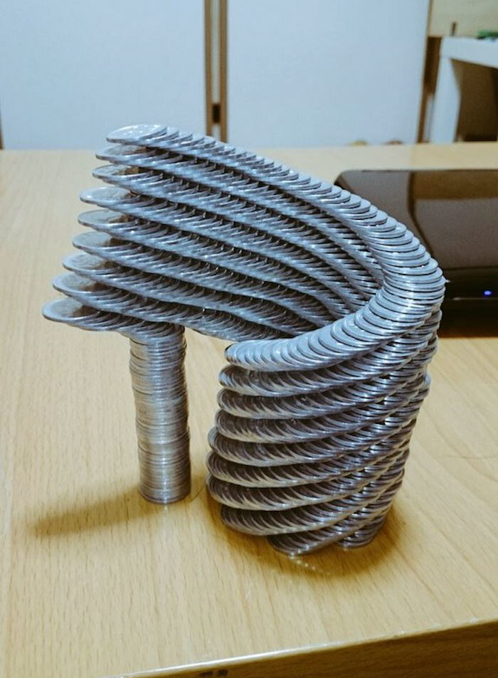 Japanese Guy Stacks Coins Like You Wouldn’t Believe