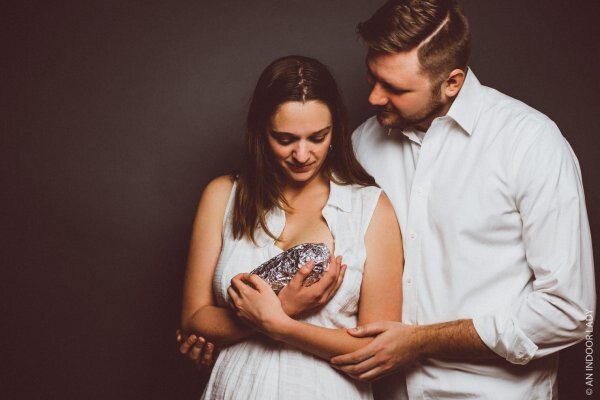 Couple Parodies Baby Photos By Posing With Their Delicious New Burrito