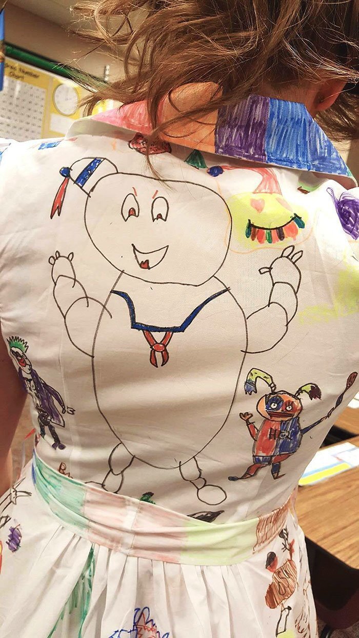 Children were not allowed to cross out anything and start over. This is why the first dress has a giant marshmallow man on it