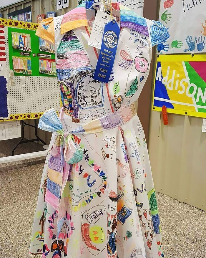 Her first dress was awarded a blue ribbon at the county fair