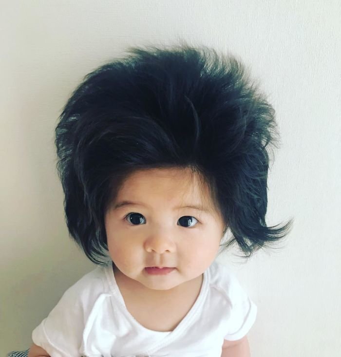 In six months this girl grew an impressive amount of hair