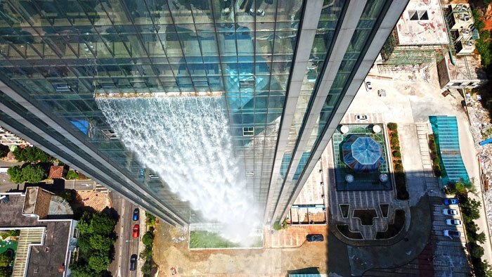 They built the world’s largest man-made waterfall onto the side of their skyscraper