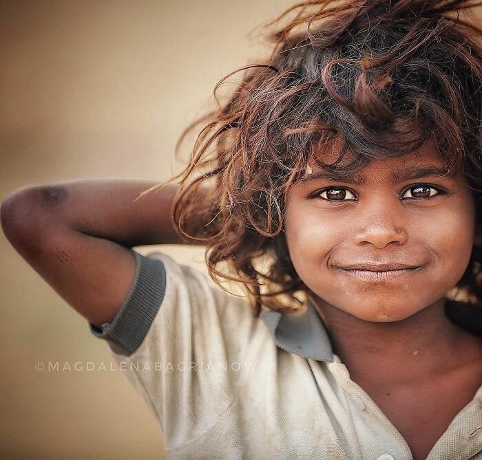 Portrait of a cute gypsy boy, taken at the Pushkar fair grounds