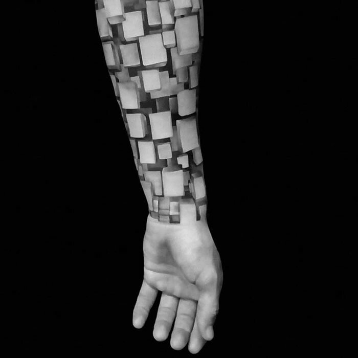 #8 Impressive Realistic Tattoo Filled With 3D Blocks