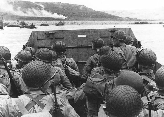Troops in an LCVP landing craft approaching Omaha Beach, Normandy, FR. D-Day; June 6th, 1944