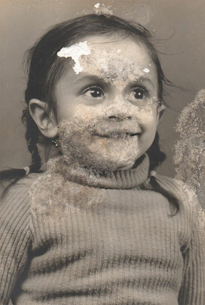 Repaired emulsion loss from the only photo of the subject as a child