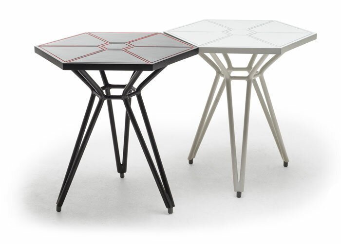 TIE Fighter tables to accompany your TIE Fighter chairs. They come in black and white, and cost $655