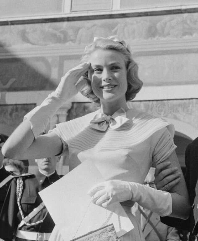April 18, 1956. Grace Kelly on the day of her civil wedding ceremony with Prince Rainier at the Prince's Palace of Monaco. Photo by Joseph McKeown.