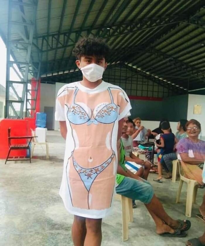 30 Funny Pics Of Filipinos Dressed Up In ‘Unsuitable’ Donated Clothes At A Volcano Evacuation Center