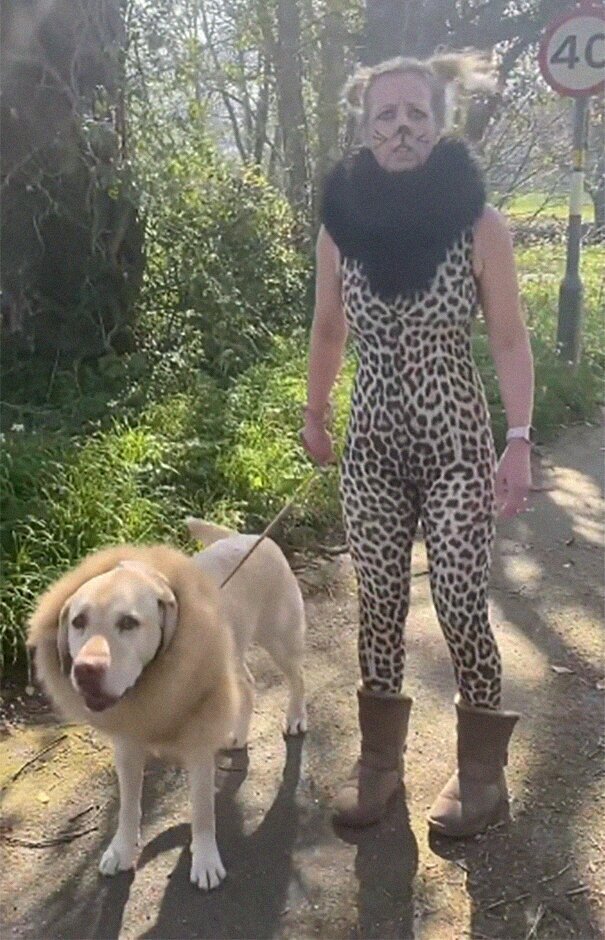 Woman Wears Bizarre Costumes While Walking Her Dog During The Quarantine And He Looks Embarrassed