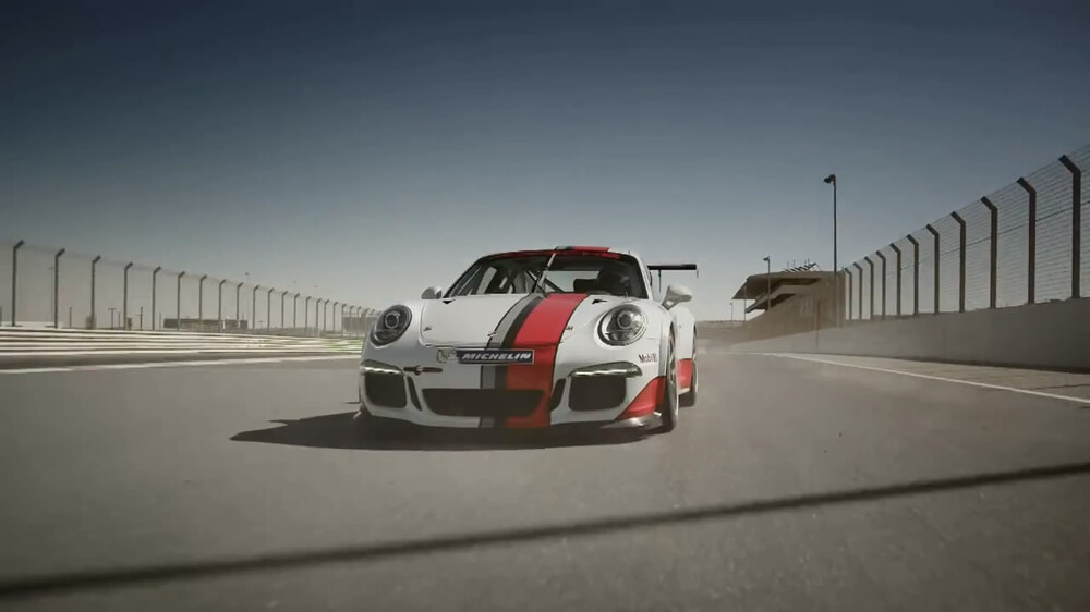Марк Уэббер попробовал отвечать на СМС за рулем гоночного Porsche 