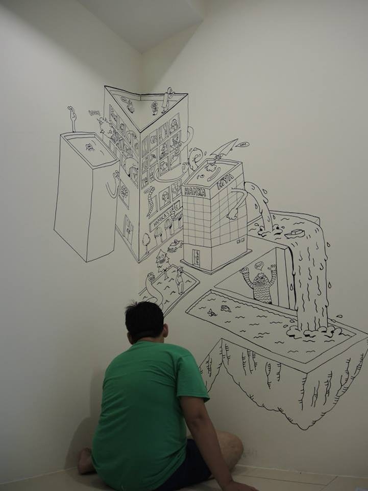 Креативный отец рисует воображаемый мир на стенах комнаты сына