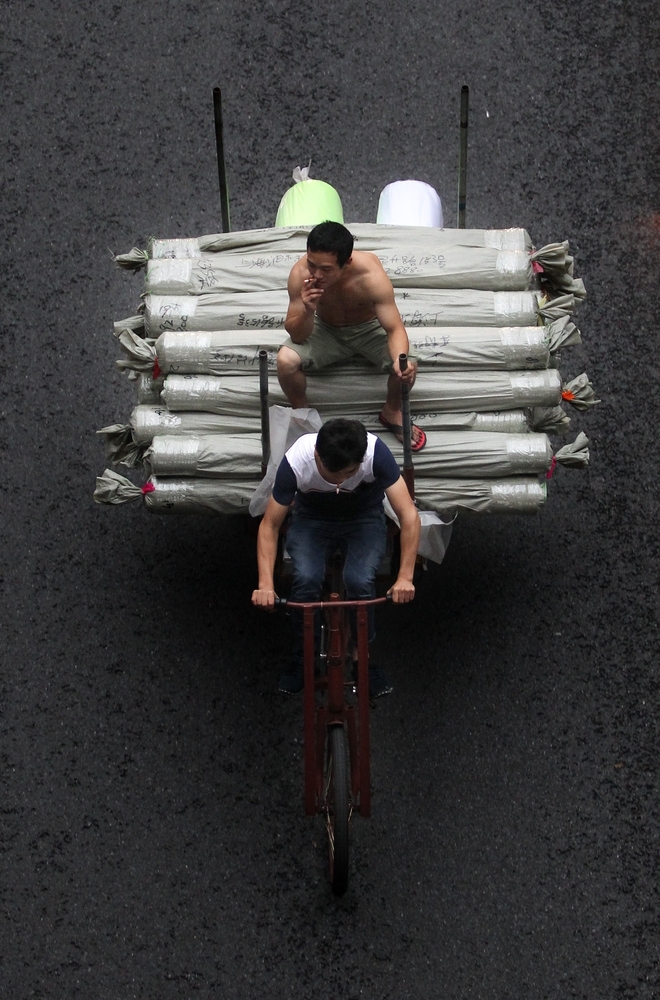 Трехколесные велосипеды и мопеды в Китае