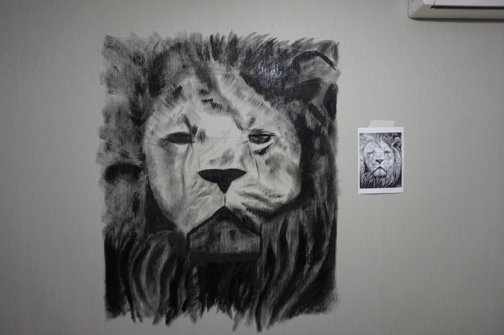 Рождение льва на стене