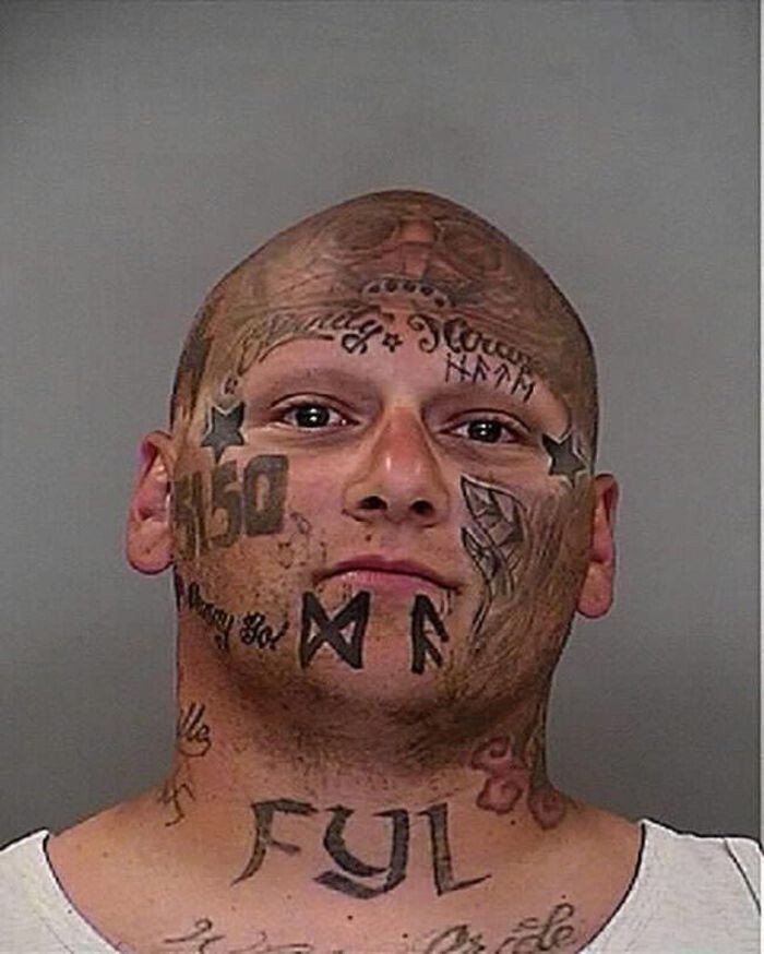 Безумные татуировки на лице