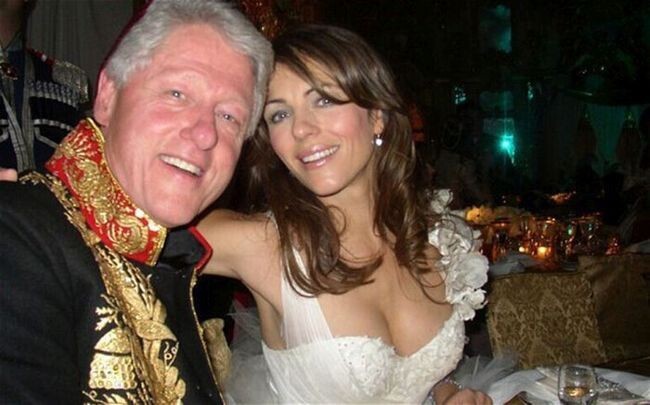 Билл Клинтон и Лиз Херли, президент США и актриса, 2005