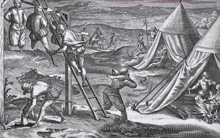 На этом рисунке, который был выгравирован Теодором де Брай, изображены голодные испанцы, отрезающие части тел повешенных воров.