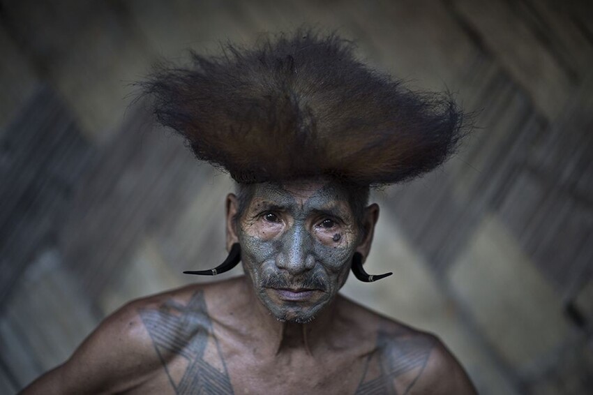 Член племени Konyak из северо-восточной Индии.