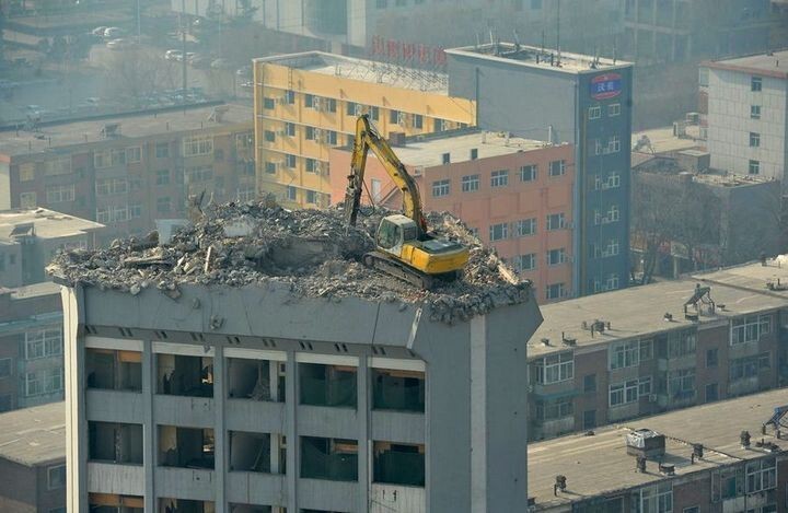 Демонтаж высотного здания по-китайски