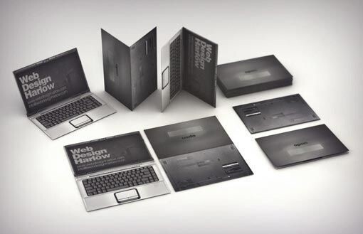 Визитка компании занимающейся веб-дизайном в виде ноутбука