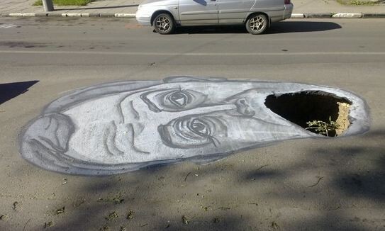 Портрет на дорожной яме.